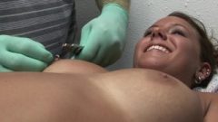 Extremely Inviting Tanned Teen Getting Nipples Pierced