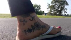 Latina Cougar Tatted Feet Taking A Summer Walk In White Worn Flip Flops