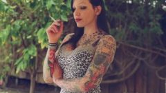 She Smokes – Busty Inked Wife Caught Smoking A Cigarette In The Backyard